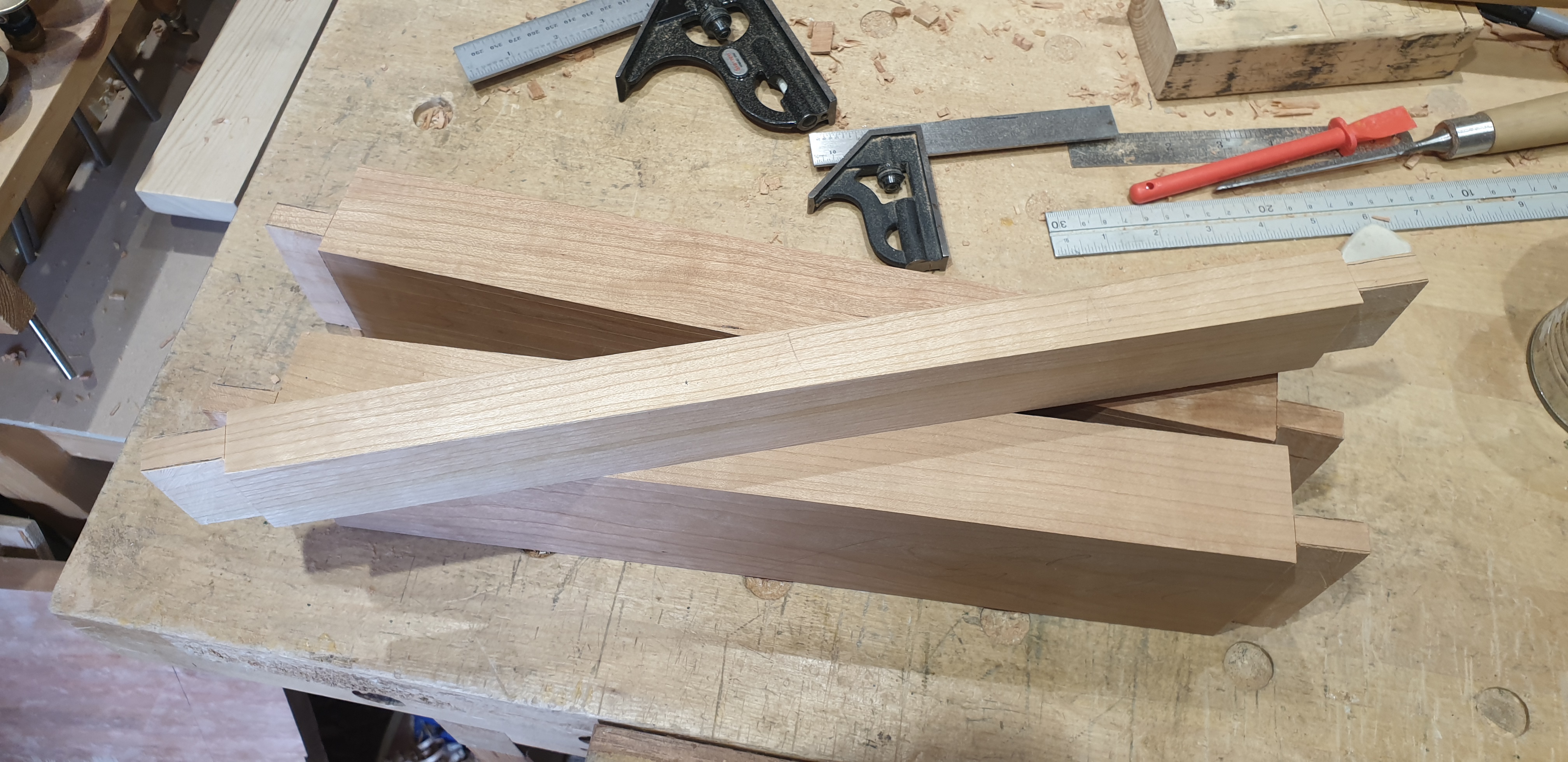 Tenons cut for the cross rails on the back legs